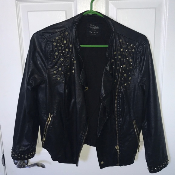 Gold studded leather jacket